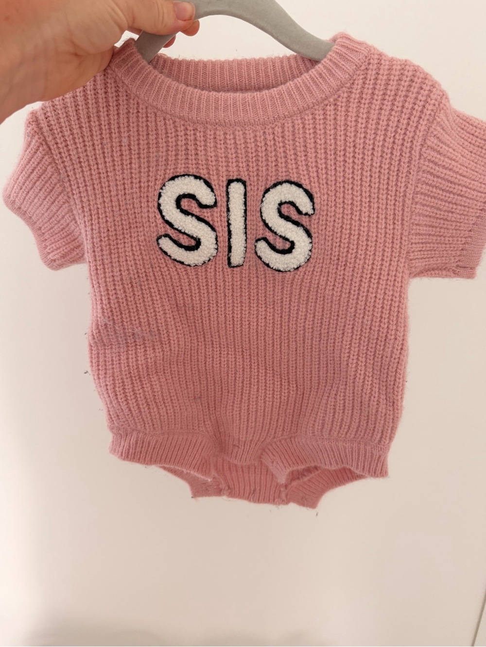 SpearmintLOVE Pink Knit Baby Romper with 'SIS' Lettering